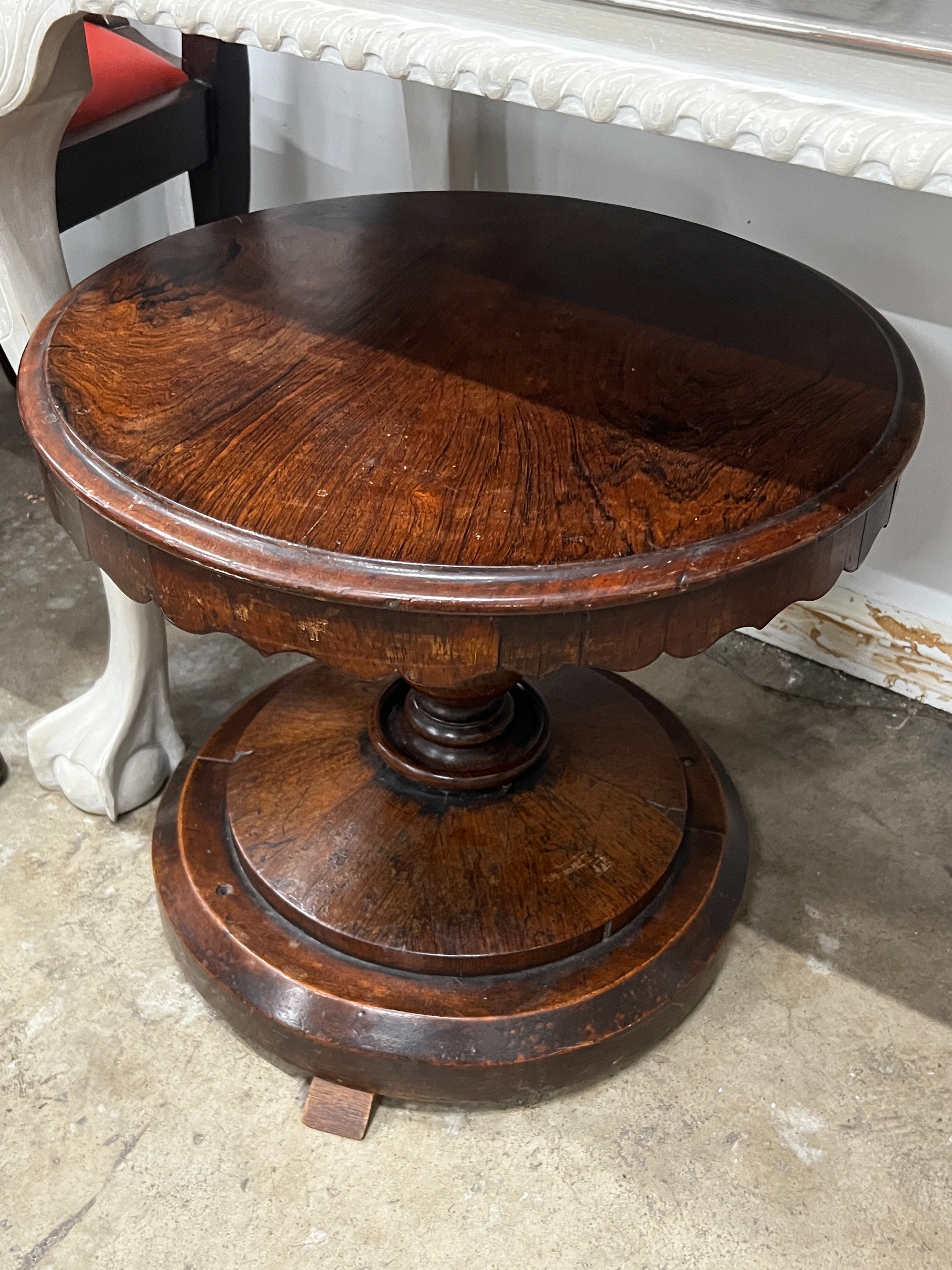 A Victorian circular rosewood occasional table (adapted) diameter 50cm height 44cm and a Chippendale revival mahogany elbow chair.